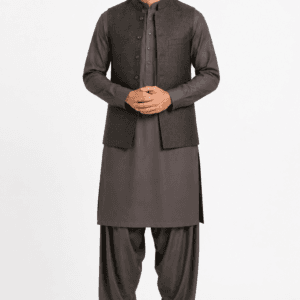 Elegant Afghan man wearing premium traditional Perahan Tunban with modern tailoring and authentic Afghan craftsmanship.